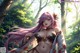 A woman with long pink hair standing in a forest.